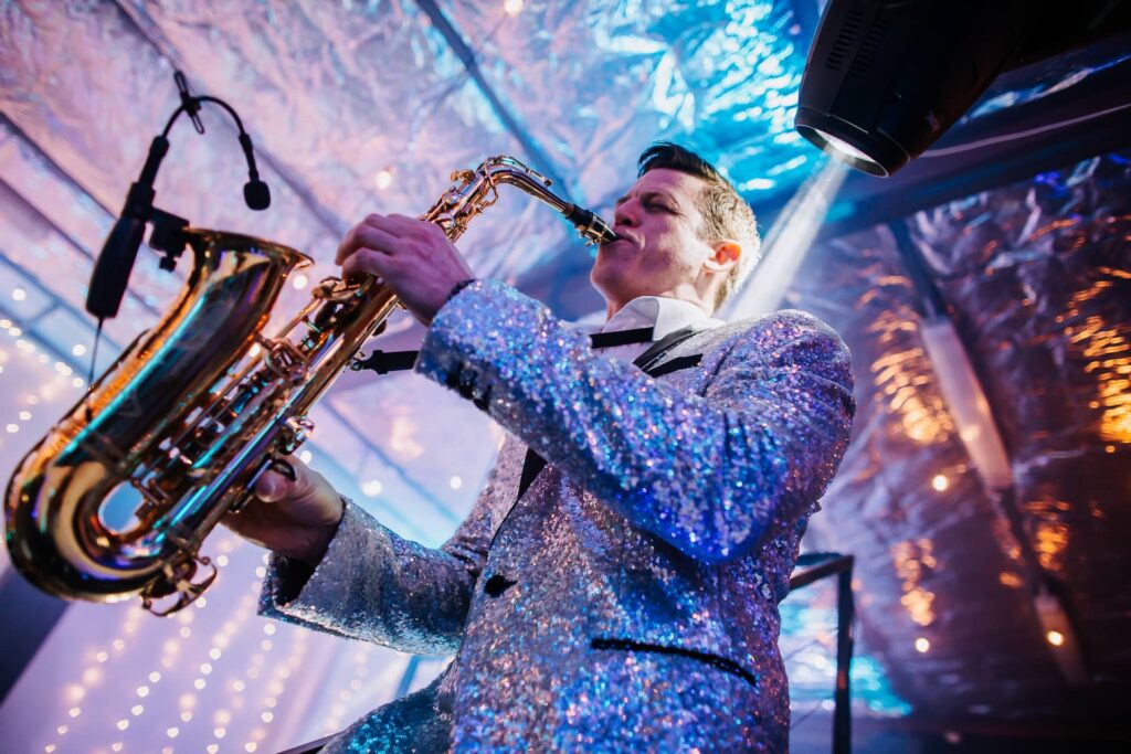 saxaphone hero shot redtie